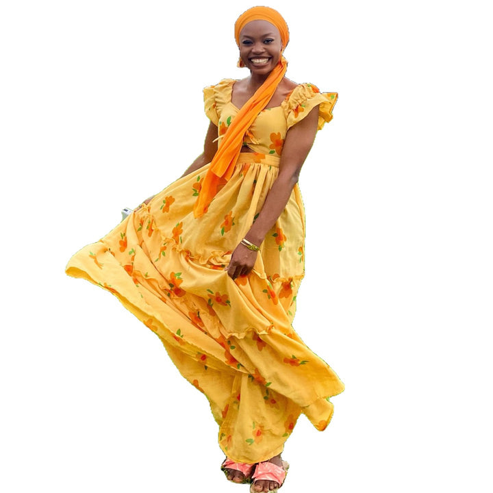 Damen Maxikleid mit voluminösen Rüschen und floralen Akzenten Drune