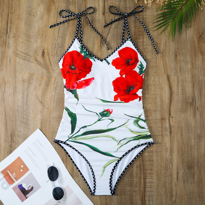 Damen Einteiler Badeanzug mit floralen Akzenten und passendem Wickelrock Drune