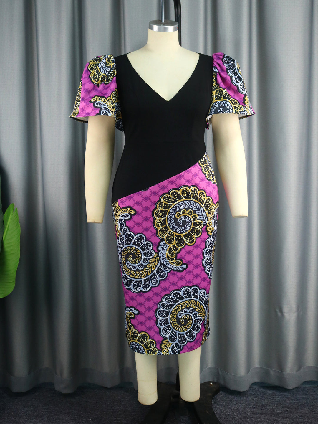 Damen figurbetontes Kleid mit bunten Puffärmeln und asymmetrischem Design Drune