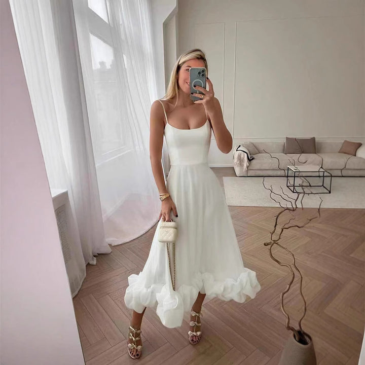 Damen Midi-Kleid mit zarten Spaghetti-Trägern und voluminösem Rüschensaum Drune
