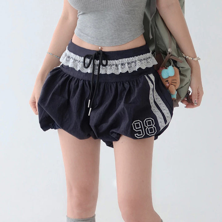 Damen sportliche und modische Shorts mit elegantem Spitzenbund und regulierbarem Taillenband Drune