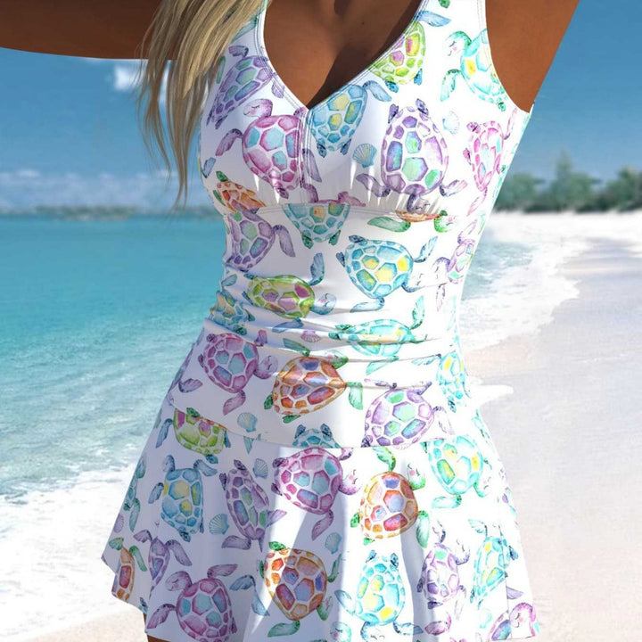 Damen Schwimmdress mit fröhlichem Schildkrötenmotiv und elegantem Rocksaum Drune