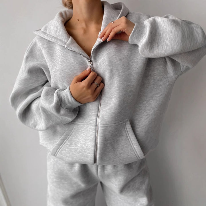 Damen lässiges Fleece-Set mit hochgeschnittener Hose und Kapuzenjacke Drune