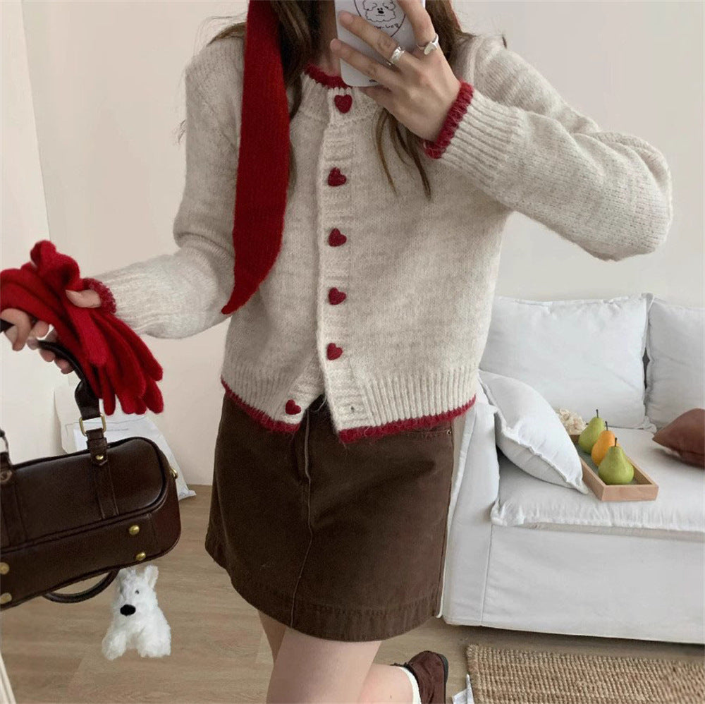 Damen kuschelige Strickjacke mit Herzknöpfen und raffinierter Ärmelgestaltung Drune
