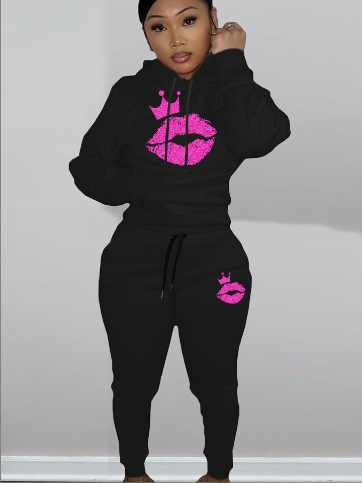 Damen Kapuzen-Pullover und Jogginghose Set mit auffälligem Lippenmotiv und Krönchen Drune
