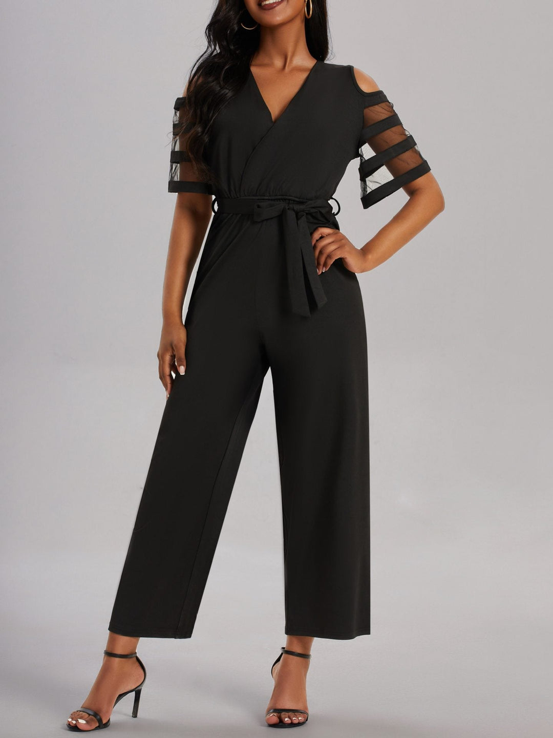 Damen Eleganter Jumpsuit mit transparenten Ärmel-Details und Taillengürtel Drune