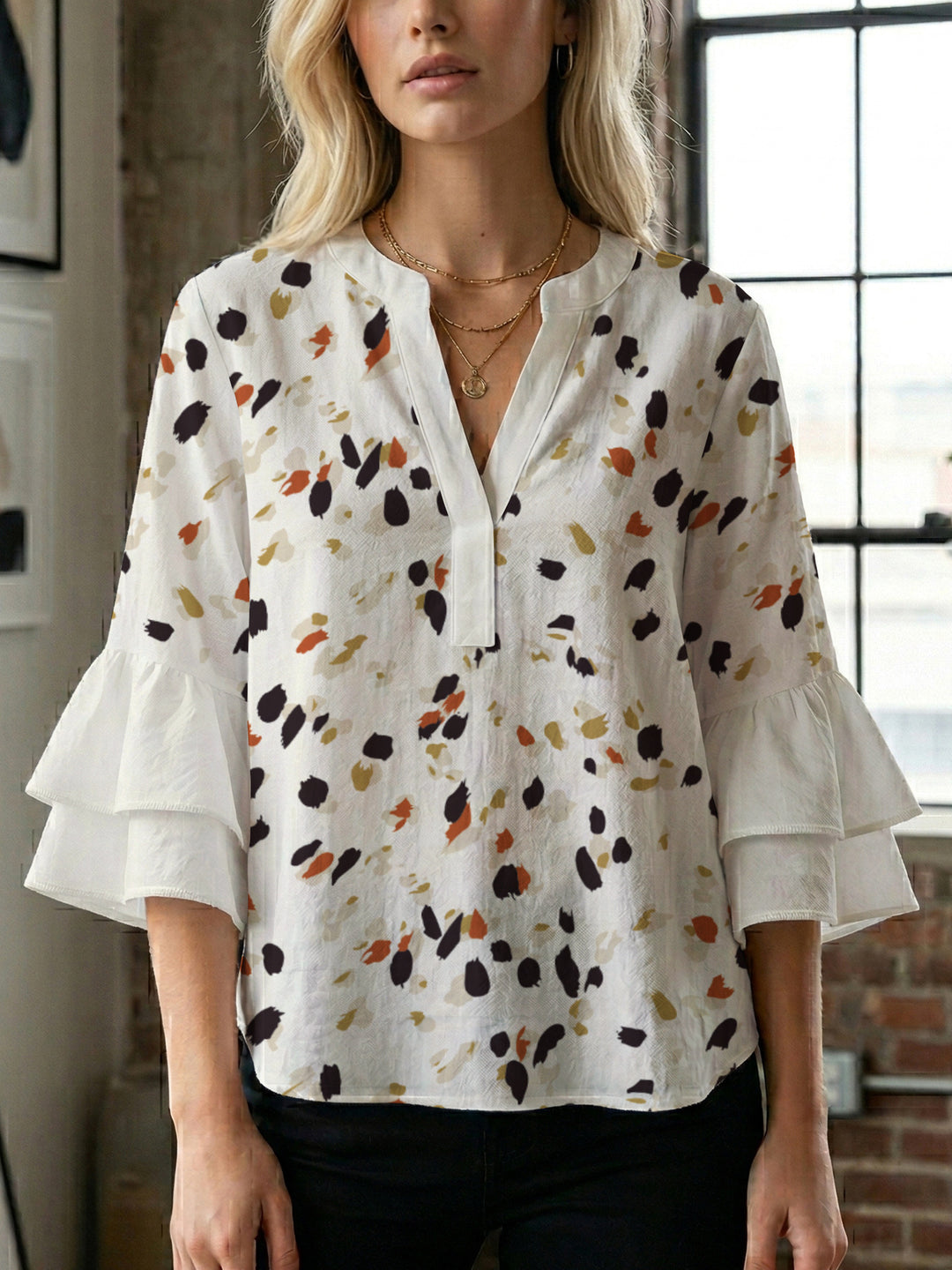 Damen Bluse mit voluminösen Rüschenärmeln und modernem Motiv Drune