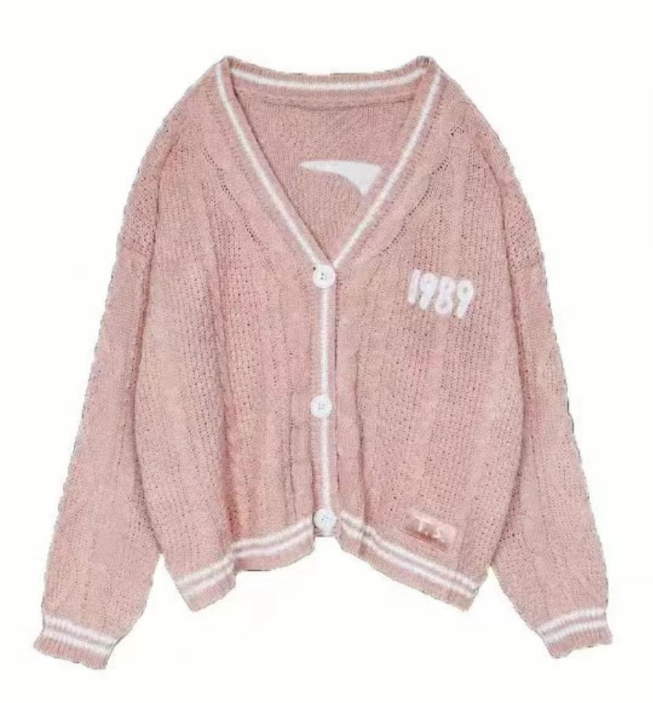 Damen nan kurz geschnittene Strickjacke mit V-Ausschnitt, Kontrastpaspel und oversized Ärmeln Drune