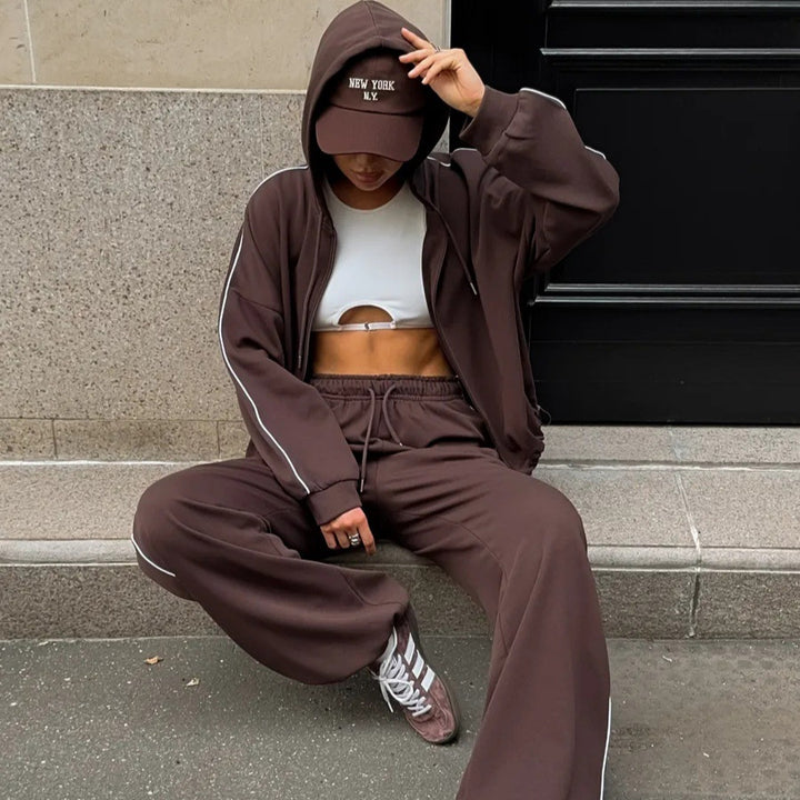 Damen sportlicher Kapuzenanzug mit weitem Schnitt und dekorativen Paspeldetails Drune