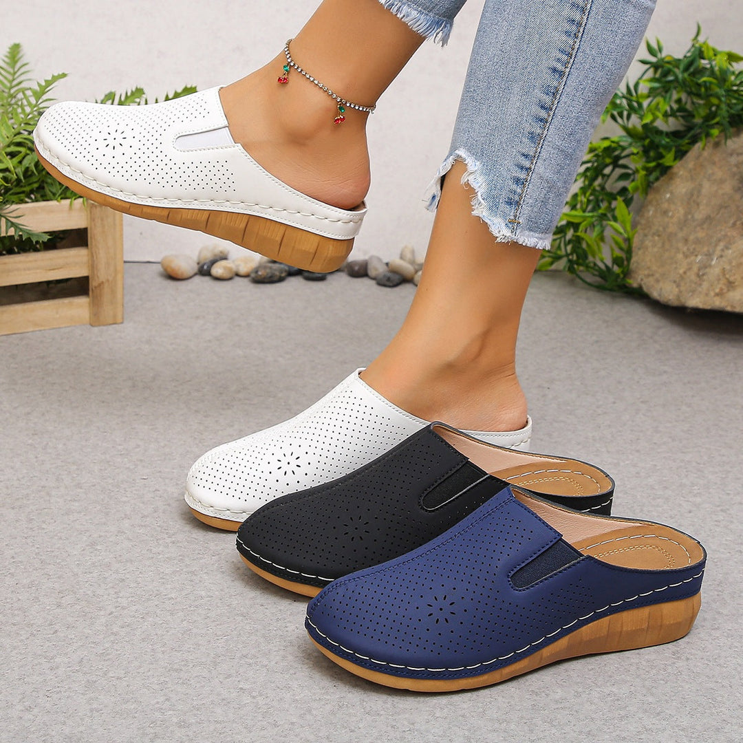 Damen Komfortable Clogs mit atmungsaktivem Leder-Obermaterial und elegantem Holz-Detail Drune