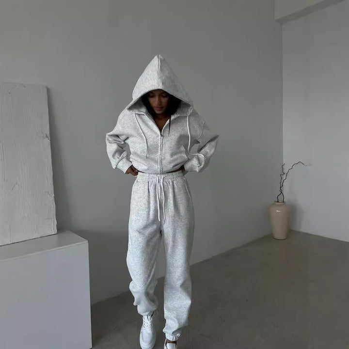 Damen sportliches Fleece-Jogginganzug mit praktischer Kapuze und Kordelzug Drune