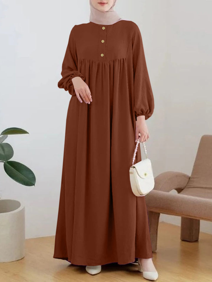 Damen luftiges Maxikleid mit bequemer Knopfleiste und eleganten Puffärmeln Drune