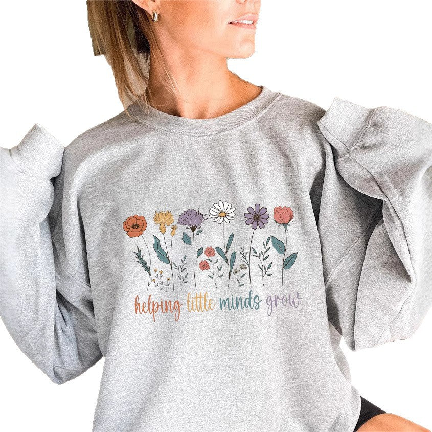 Damen Sweatshirt mit voluminösen Ärmeln und motivierendem Blumenaufdruck Drune