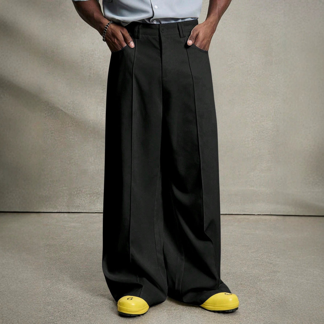Herren nan weite Bundfaltenhose mit hoher Bundhöhe, präzisen Bügelfalten und seitlichen Eingrifftaschen Drune