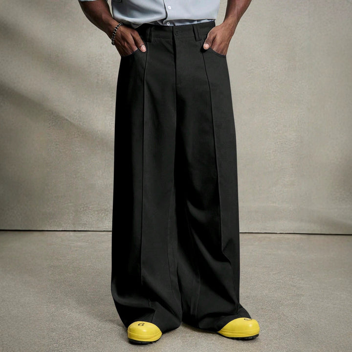 Herren nan weite Bundfaltenhose mit hoher Bundhöhe, präzisen Bügelfalten und seitlichen Eingrifftaschen Drune