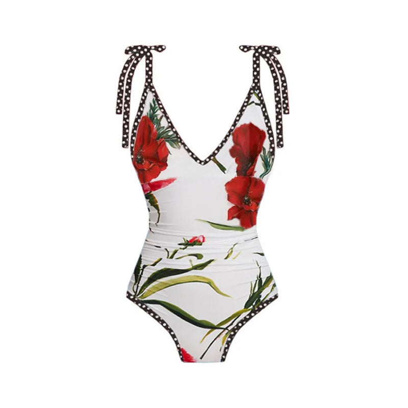 Damen Einteiler Badeanzug mit floralen Akzenten und passendem Wickelrock Drune