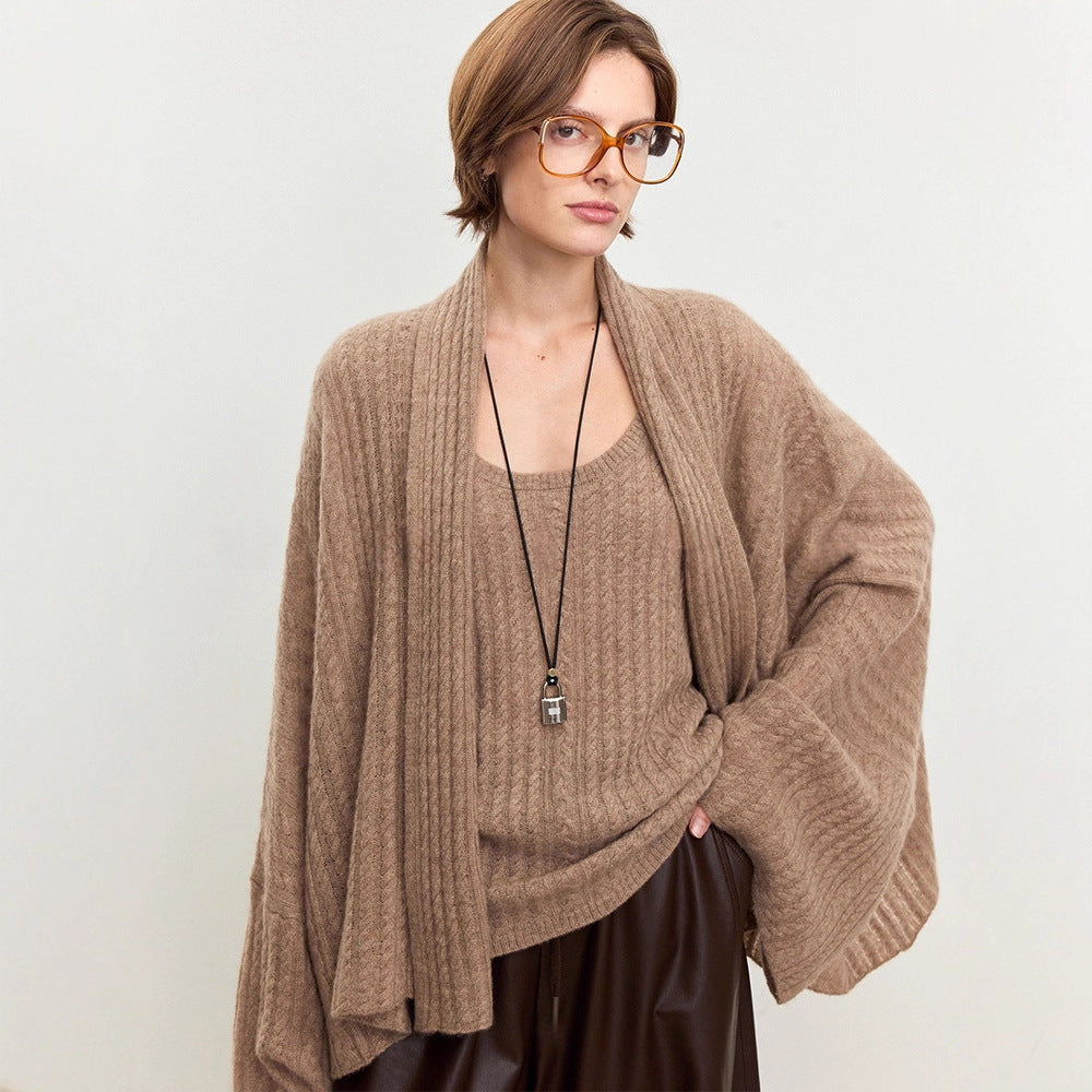 Damen luftiger Strickponcho aus feiner Wolle Drune