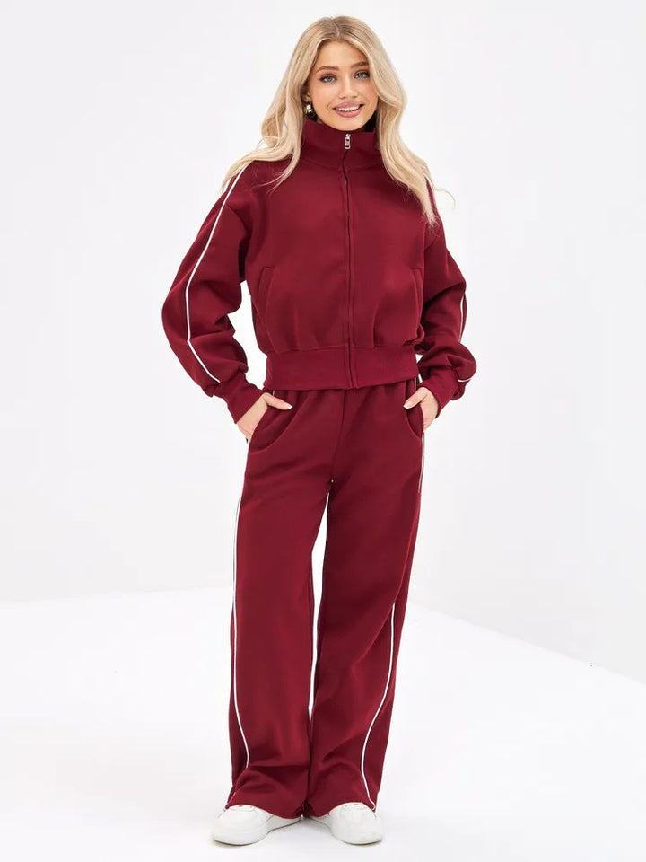 Damen sportliches Freizeit-Set mit hochgeschlossener Jacke und weit geschnittenen Hosen Drune