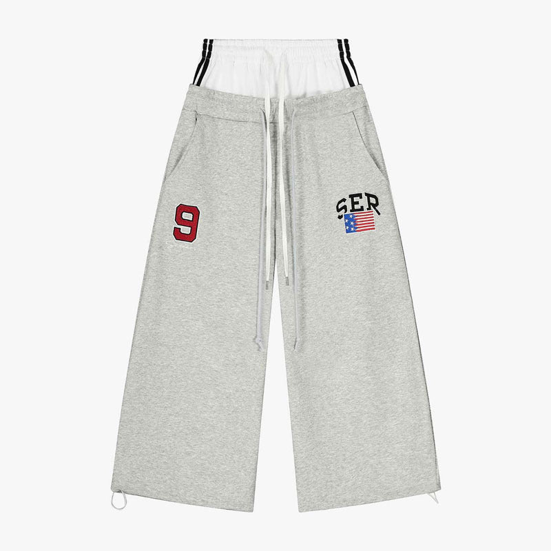 Damen Modische Sweathose mit weitem Schnitt und Sportstreifen Drune