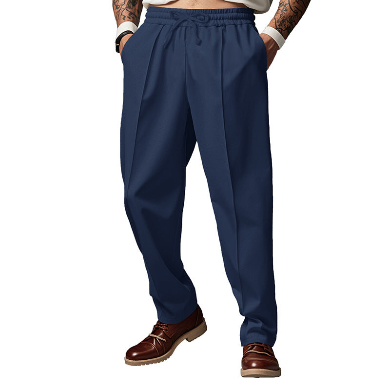 Herren nan schlanke Tapered-Jogginghose mit elastischem Tunnelzugbund, formgebender Bügelfalte und seitlichen Eingrifftaschen Drune