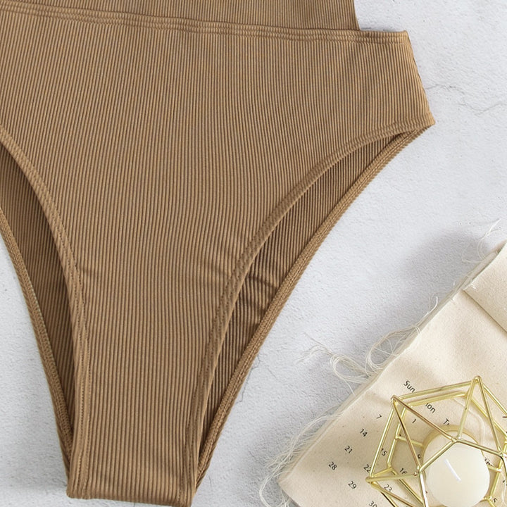 Damen Einteiler Badeanzug mit elegantem Schnitt und seitlichen Riemen Drune