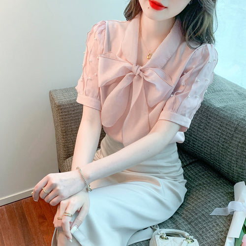 Damen Bluse mit elegantem Schleifen-Ausschnitt und strukturierten Ärmeln Drune