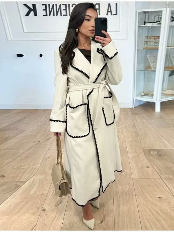 Damen eleganter Longcoat mit Bindegürtel und kontrastierenden Paspeln Drune