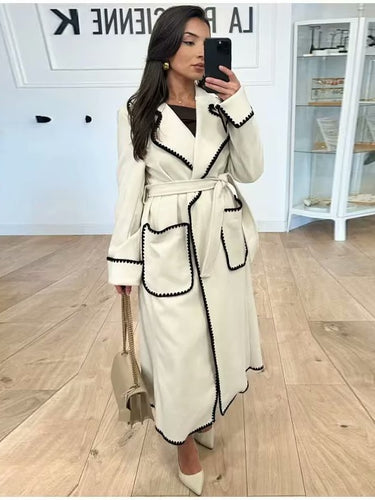 Damen eleganter Longcoat mit Bindegürtel und kontrastierenden Paspeln Drune