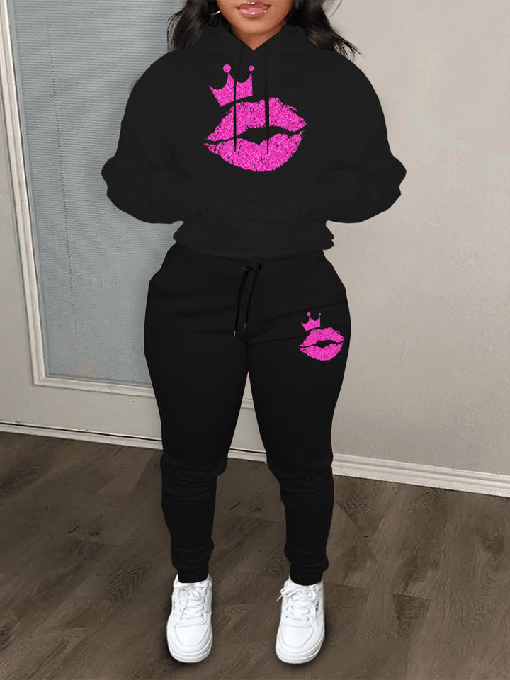 Damen Kapuzen-Pullover und Jogginghose Set mit auffälligem Lippenmotiv und Krönchen Drune