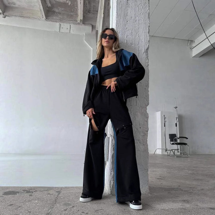 Damen modisches Freizeit-Outfit mit sportlicher Jacke und kreativen Cut-Out-Hosen Drune
