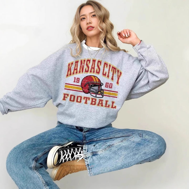 Damen Oversized Sweatshirt mit nostalgischem Football-Motiv Drune