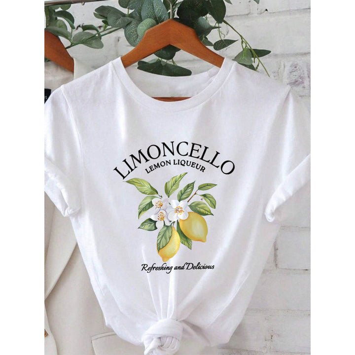 Damen T-Shirt mit frischem Limoncello-Motiv und floralen Akzenten Drune