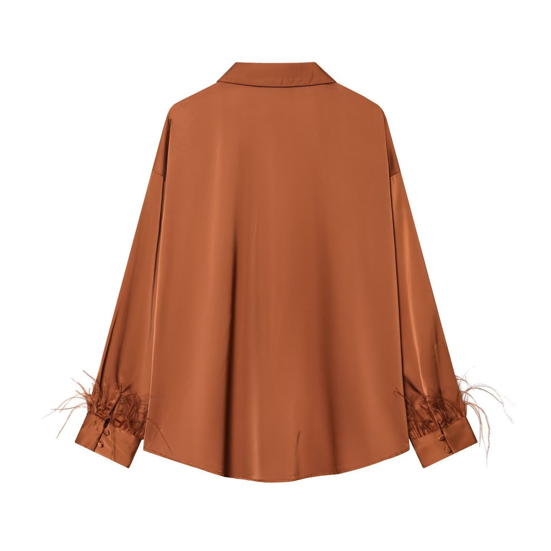 Damen Seidenbluse mit eleganten Federn an den Ärmelabschlüssen Drune