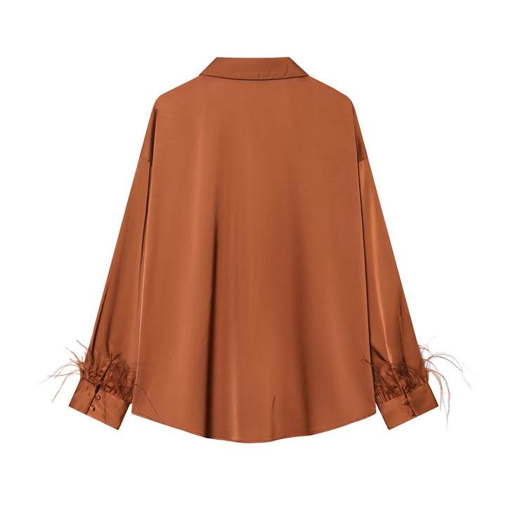 Damen Seidenbluse mit eleganten Federn an den Ärmelabschlüssen Drune