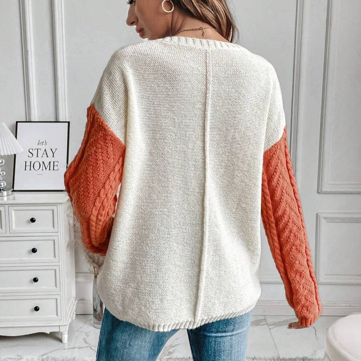 Damen Gemusterter Strickpullover mit bunten Kontrastärmel und Taschen Drune