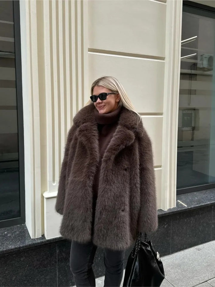 Damen Modische Kunstfelljacke mit voluminösen Ärmeln Drune