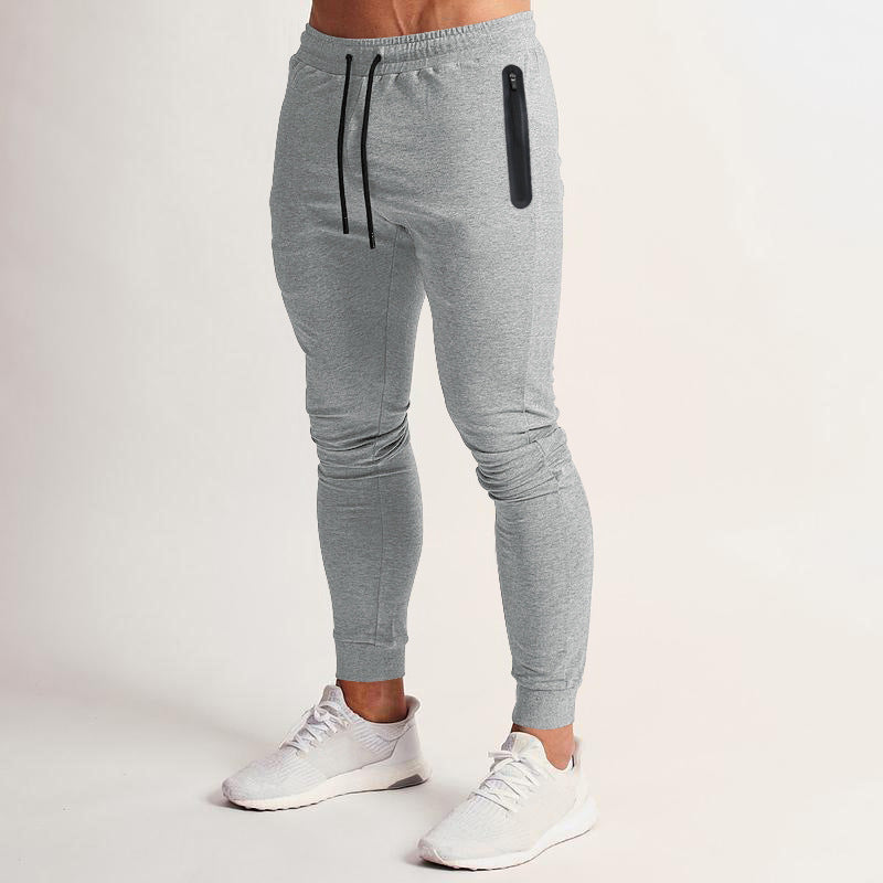 Herren nan schmal geschnittene Funktions-Jogginghose mit wasserdichter Reißverschlusstasche und elastischem Bund Drune
