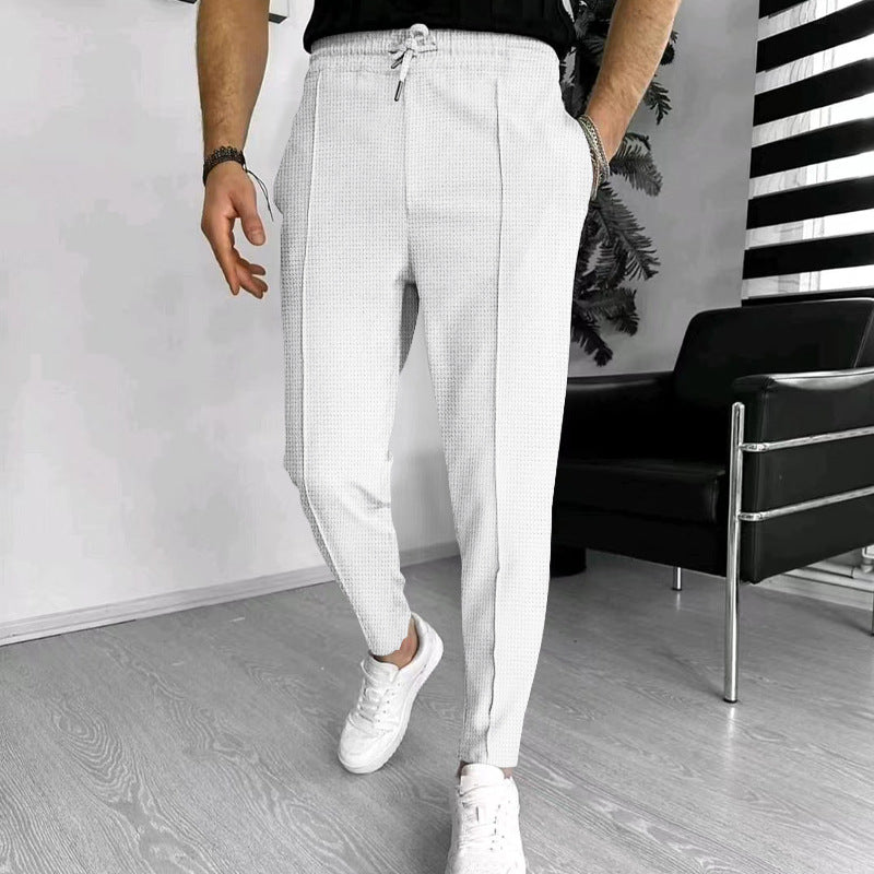 Herren nan schmal zulaufende Jogging-Chino aus strukturierter Webqualität mit elastischem Tunnelzugbund und dekorativer Bügelfalte Drune