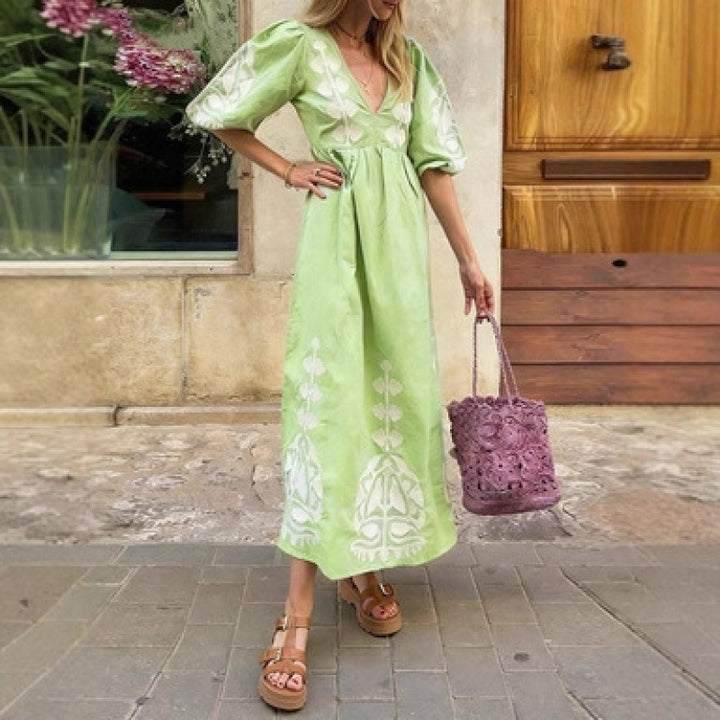Damen Midikleid mit luftigen Puffärmeln und floralem Stickdesign Drune