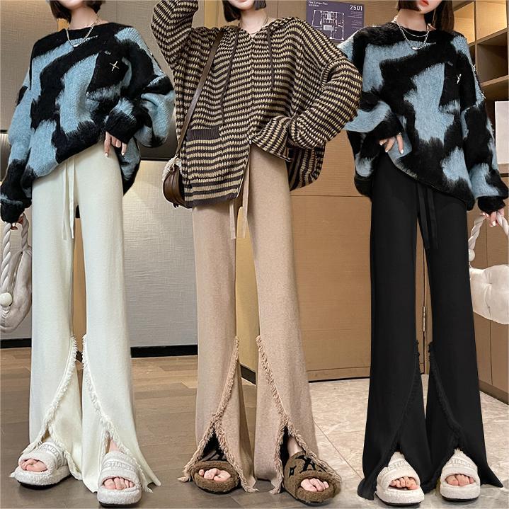Damen Elegante Hose mit hohen Seitenschlitzen und fransigen Abschlüssen Drune