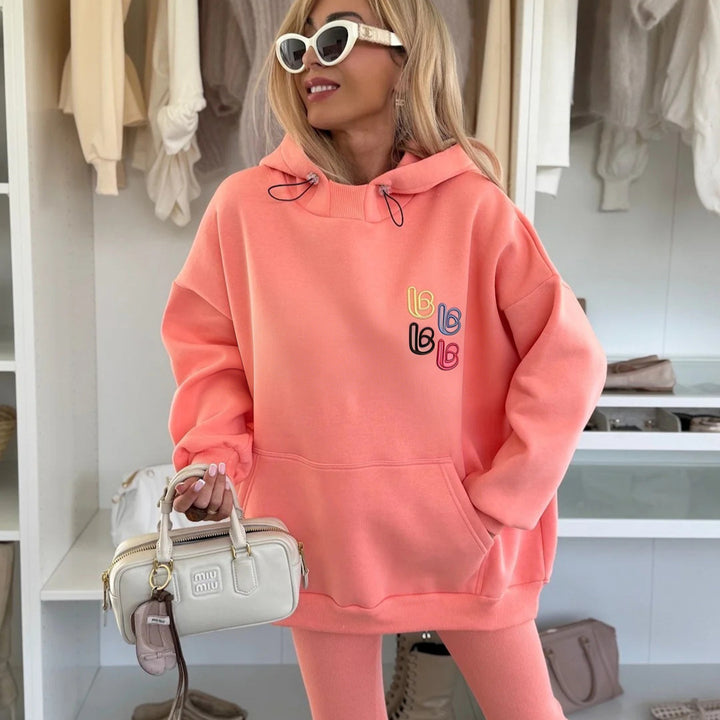 Damen Oversized Hoodie mit buntem Logo und bequemen Leggings Drune