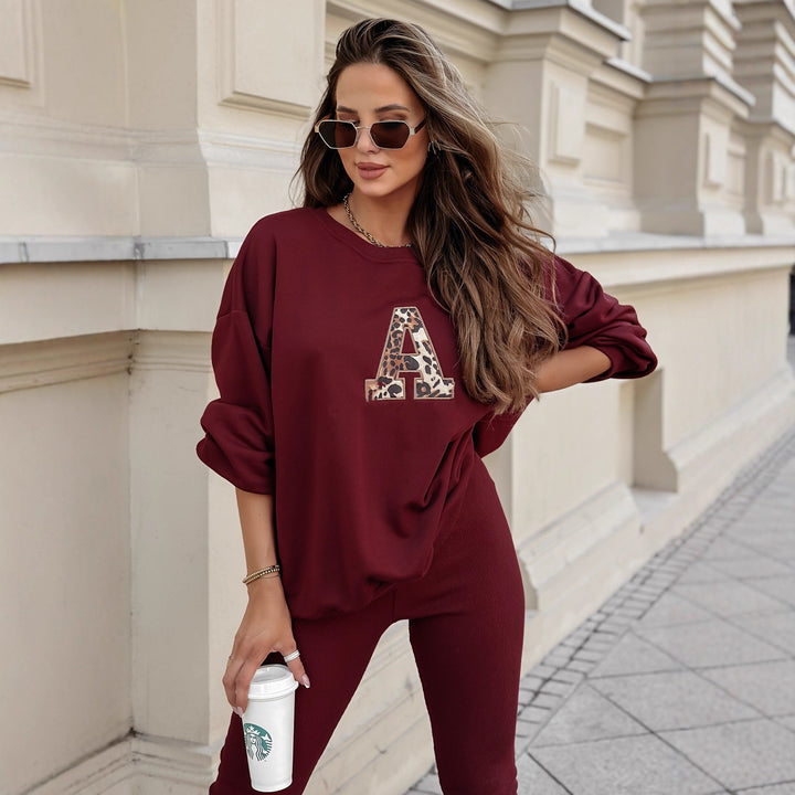 Damen lässiges Sweatshirt mit großem Initial und entspannter Passform Drune