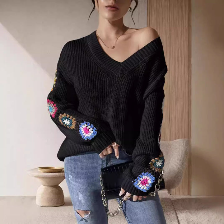Damen modischer Strickpullover mit einzigartiger Schnittführung und kreativen Häkelmotiven Drune