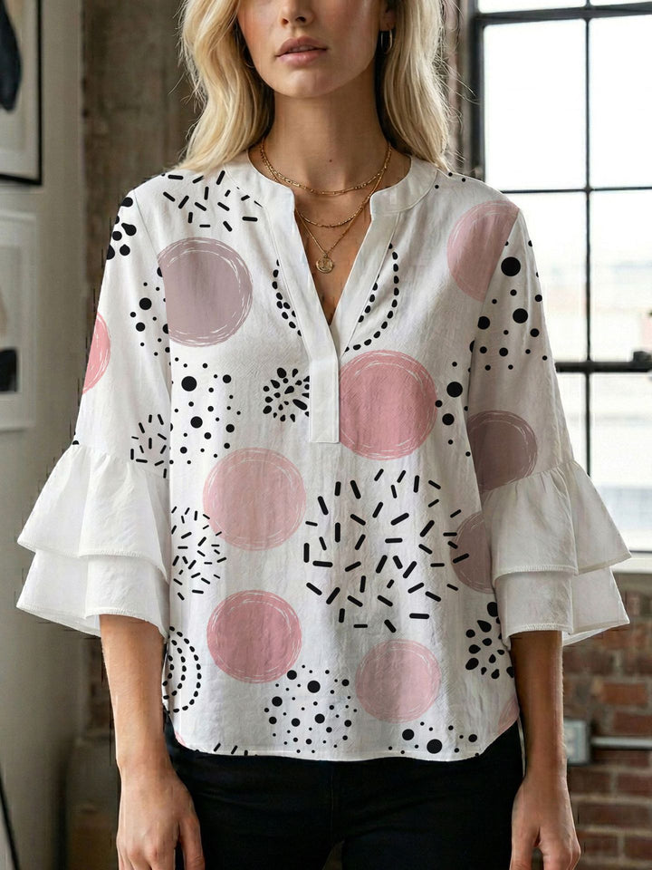 Damen Bluse mit voluminösen Flügelärmel und intensivem Blattmuster Drune