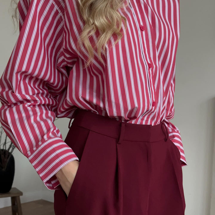 Damen gestreifte Bluse mit voluminösen Ärmeln und modischen Knopfdetails Drune