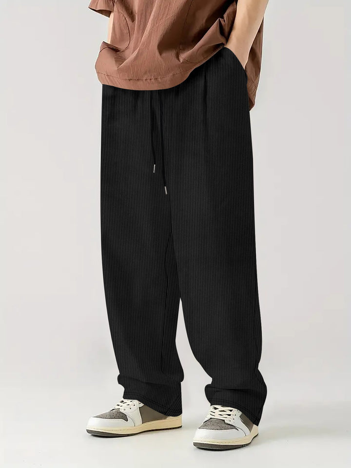Herren nan weite Relax-Freizeithose aus geripptem Jersey mit Kordelzug, Seitentaschen und weitem Bein Drune