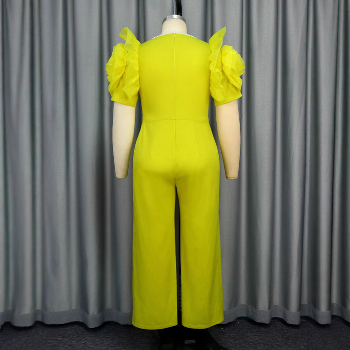 Damen eleganter Jumpsuit mit voluminösen Puffärmeln und Perlenakzent Drune