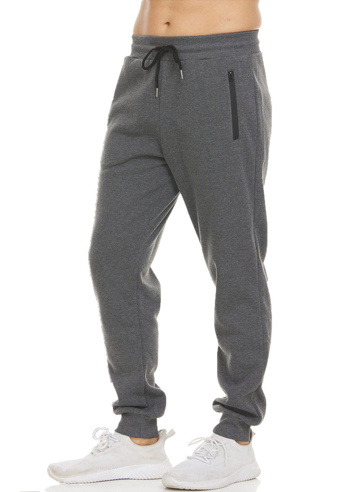 Damen nan tapered Jogginghose mit elastischem Komfortbund, wasserabweisender Reißverschlusstasche und geripptem Knöchelabschluss Drune