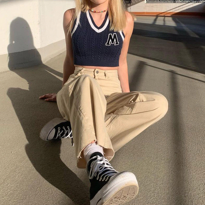 Damen cropped Strickoberteil mit V-Ausschnitt und Kabelmuster Drune