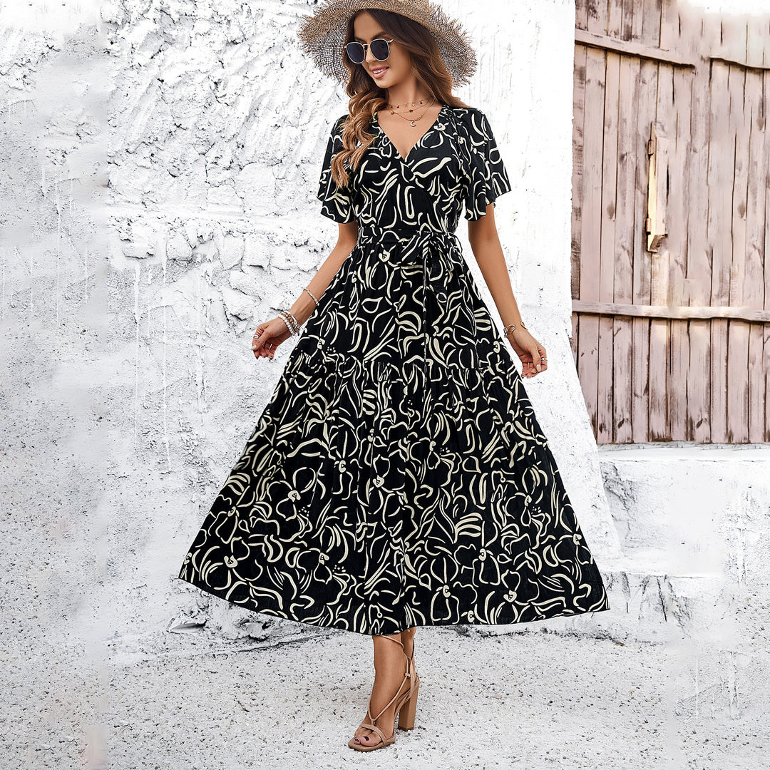 Damen Wickelkleid mit voluminösen Ärmeln und verspieltem Muster Drune